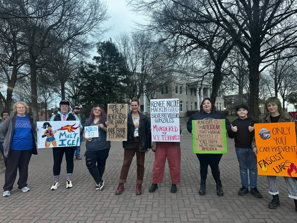 A small crowd of protestors gathered on the court square in uptown Shelby Jan. 8, 2026 following the shooting death of Minneapolis woman, Renee Good.